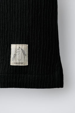 CONJUNTO CAMISA BOWLNG Y BERMUDA TEXTURA ETIQUETA / Negro - Zara фото 8