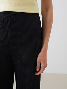 Beli Lastikli Dokulu Kad?n Pantolon