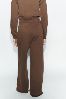 WASHED-EFFECT FLEECE TROUSERS WITH STUDS - Zara фото 7