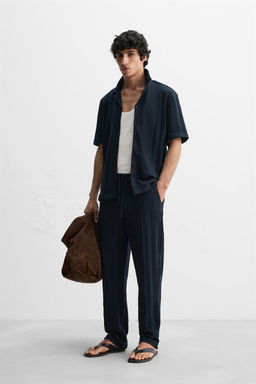 STRIPED TEXTURED TROUSERS