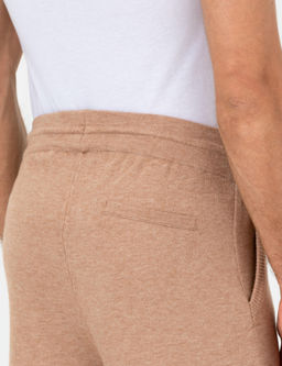 Бежевые зауженные брюки из эластичного трикотажа - Cacharel фото 7