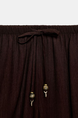 PANTAL?N FLUIDO RECTO / Marr?n oscuro