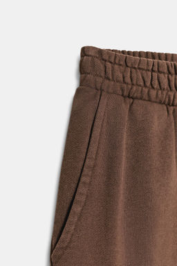WASHED-EFFECT FLEECE TROUSERS WITH STUDS - Zara фото 14