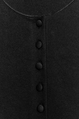 TOP CHALECO BOTONES / Negro