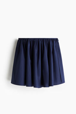 Minifalda circular con lazadas decorativas