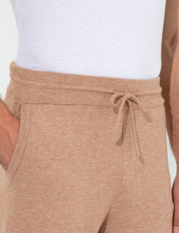 Бежевые зауженные брюки из эластичного трикотажа - Cacharel фото 5