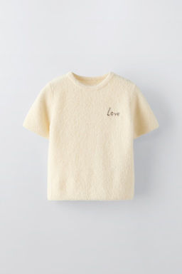 KNIT SWEATER WITH SLOGAN