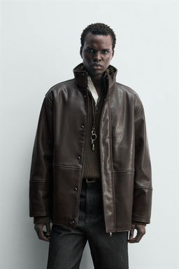 CONTRAST leather effect JACKET