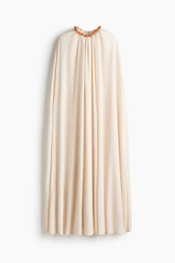 Vestido capa con cuentas