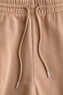 Pantal?n con cord?n de ajuste y pliegue decorativo - H&m фото 6