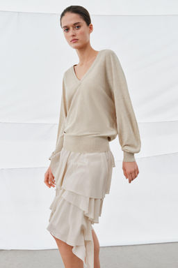 JERSEY CON LANA ESCOTE PICO / Arena / Vigor?