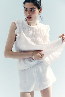 Top nido de abeja con peplum - H&m фото 8