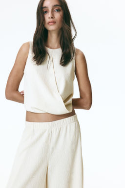 Top efecto arrugado con detalle cruzado - H&m фото 3