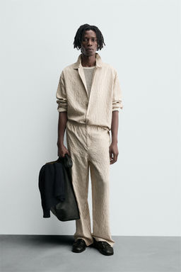 STRIPED WRINKLED-EFFECT FLOWING TROUSERS