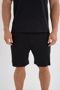 Шорты трикотажные Черный ANTA ICONIC Knit Half Pants