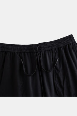 Брюки трикотажные Черный ANTA SPORTS CLUB Knit Track Pants  фото 3
