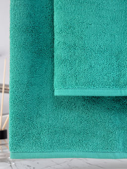 Махровое полотенце без бордюра изумрудное ПМ-15 50х90