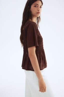 Top nido de abeja con peplum - H&m фото 6
