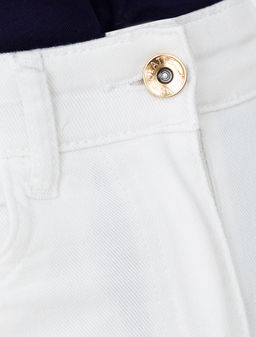 Джинсы клеш с прорезями и необработанным краем из эластичного денима средней плотности - Vilatte фото 4