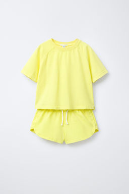 CONJUNTO JOGGING CAMISETA Y BERMUDA LISO / Amarillo
