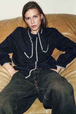 BLOUSE WITH TIE AND CONTRAST TOPSTITCHING