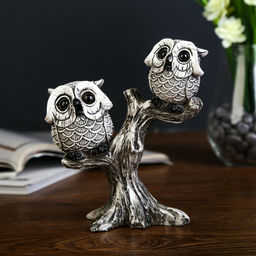 Фигурка полистоун «Два маленьких филина с большими глазами на дереве», 16.5×14.5×6 см