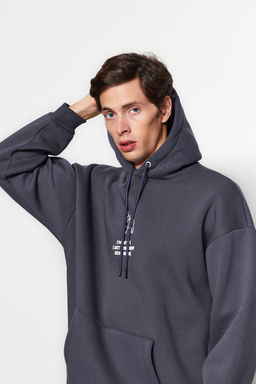 TRENDYOL MAN Kahverengi Oversize/Genis Kesim Kabaran Hayvan Bask?l? Kapusonlu Sweatshirt TMNAW24SW00078