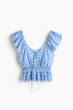 Blusa de manga circular con peplum