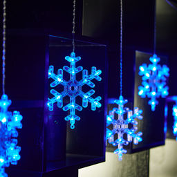 ULD-E1503-072/DTA BLUE IP20 SNOWFLAKES-3 Занавес фигурный светодиодный, 1,5х0,3м. 72 светодиода. Синий свет. Провод прозрачный. TM Uniel