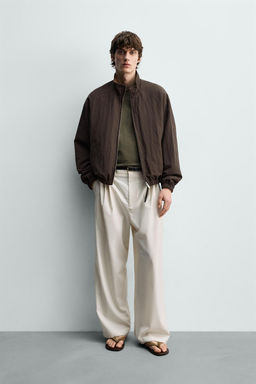 CAZADORA BOMBER FLUIDA REVERSIBLE / Marr?n