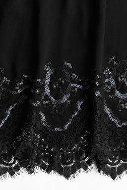 Blusa de gasa con lazada y lentejuelas - H&m фото 7