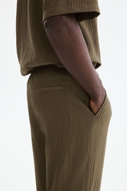 Pantal?n texturizado Relaxed Fit - H&m фото 7