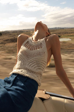 DISTRESSED KNIT HALTER TOP