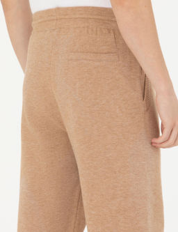 Бежевые зауженные трикотажные брюки с высоким воротником - Cacharel фото 7