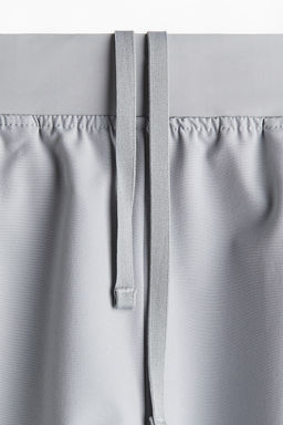 Pantalon de deporte extracorto en DryMove - H&m фото 7