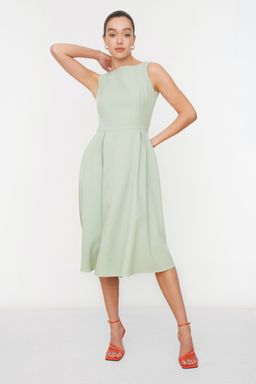 TRENDYOLMILLA Siyah Belden Ac?lan Pileli Midi Dokuma Elbise TWOSS20EL0980