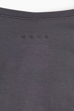 Top de deporte cruzado en modal - H&m фото 12