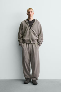 SUDADERA LAVADA CREMALLERA CAPUCHA / Gris claro