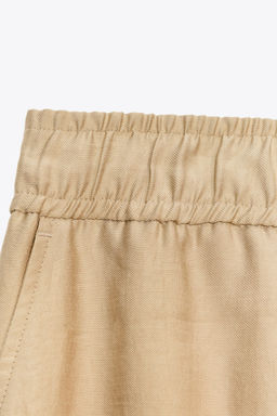 WIDE-LEG TROUSERS WITH ELASTIC WAIST