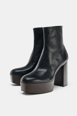 PLATFORM HEELED ANKLE BOOTS