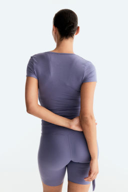 Top de deporte cruzado en modal - H&m фото 5