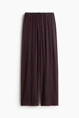 Pantal?n transparente con cord?n de ajuste
