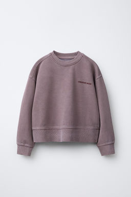 FADED-EFFECT SLOGAN SWEATSHIRT