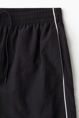 Pantal?n de ch?ndal en nailon Relaxed Fit - H&m фото 3