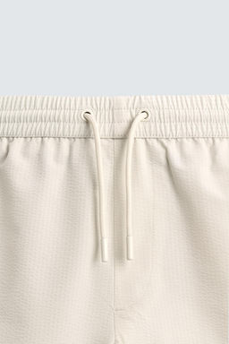 MID-LENGTH SEERSUCKER SWIMMING TRUNKS - Zara фото 9