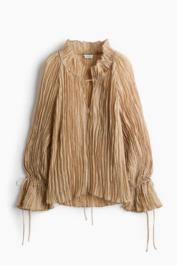 Blusa oversize efecto arrugado