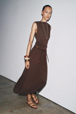 KNITTED CUT-OUT SKIRT WITH BELT
