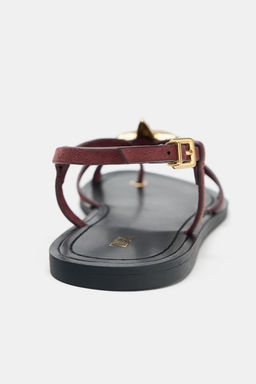 STRAPPY SANDALS WITH METAL DETAIL