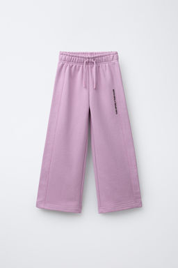 WIDE-LEG TEXT TROUSERS