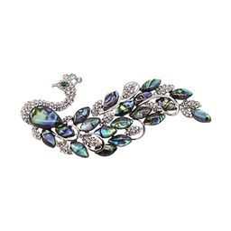 Брошь перламутр Павлин гелиотис, с длинным хвостом